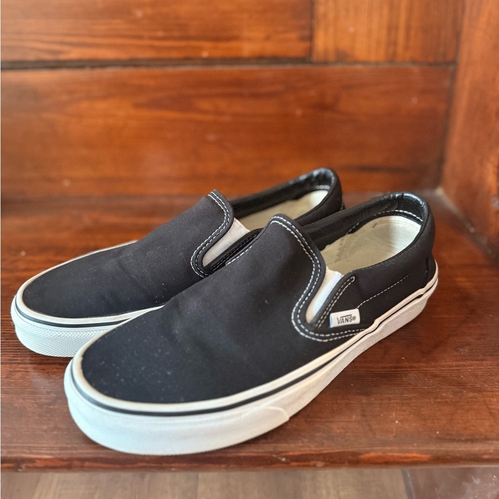 Vans Black and White Slip-On Sneakers